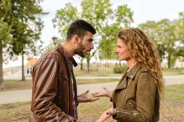 couple arguing outside