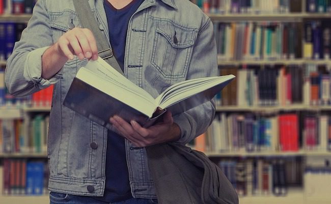 college student in library